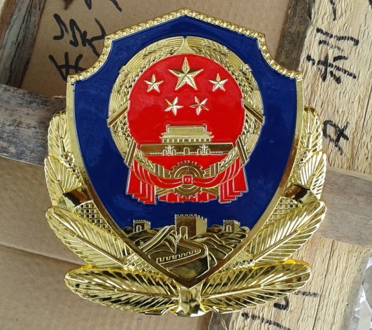 1783332733123479.jpg 镀金小警徽.jpg